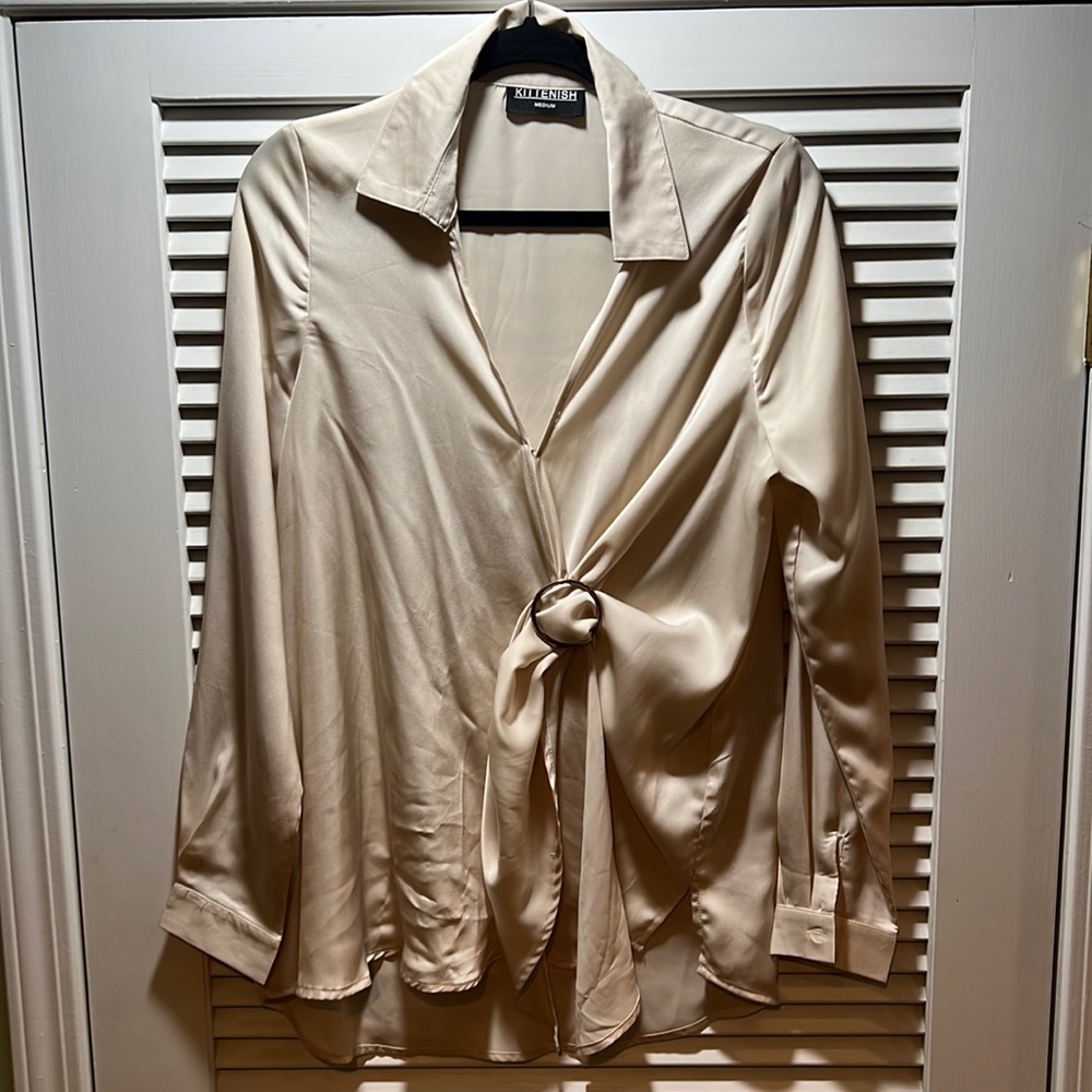 Kittenish champagne colored blouse